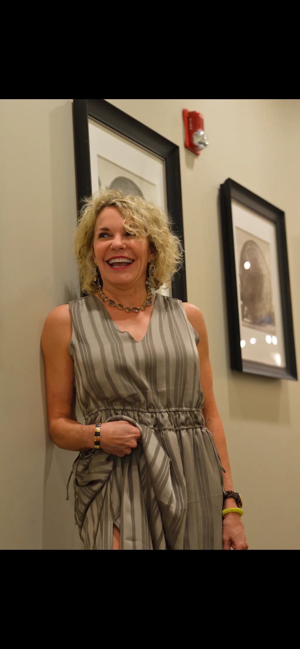 Joyful Elegance: A Moment of Radiance in Stripes and Smiles