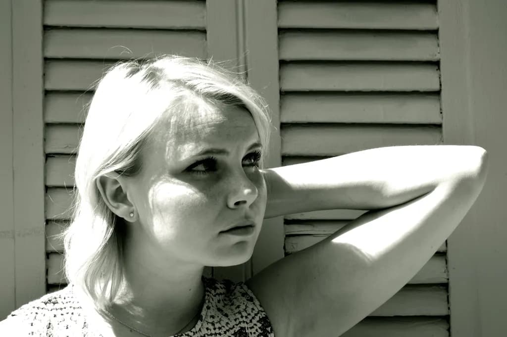 Whispers of Light: A Contemplative Portrait in Monochrome
