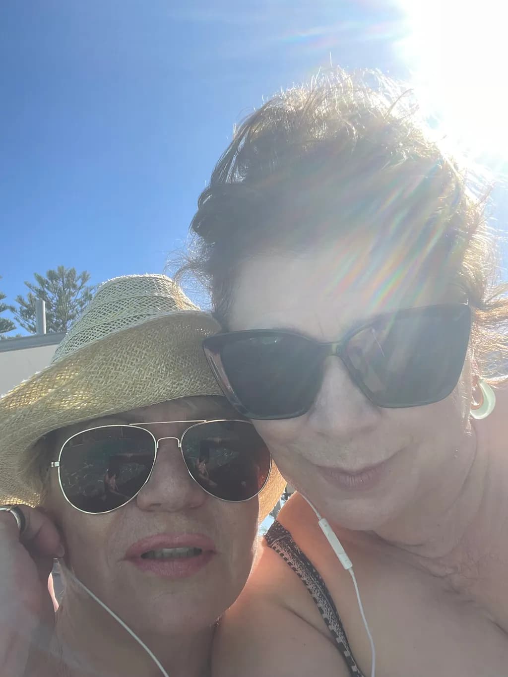 Sunlit Moments: A Joyful Embrace of Friendship and Summer Vibes