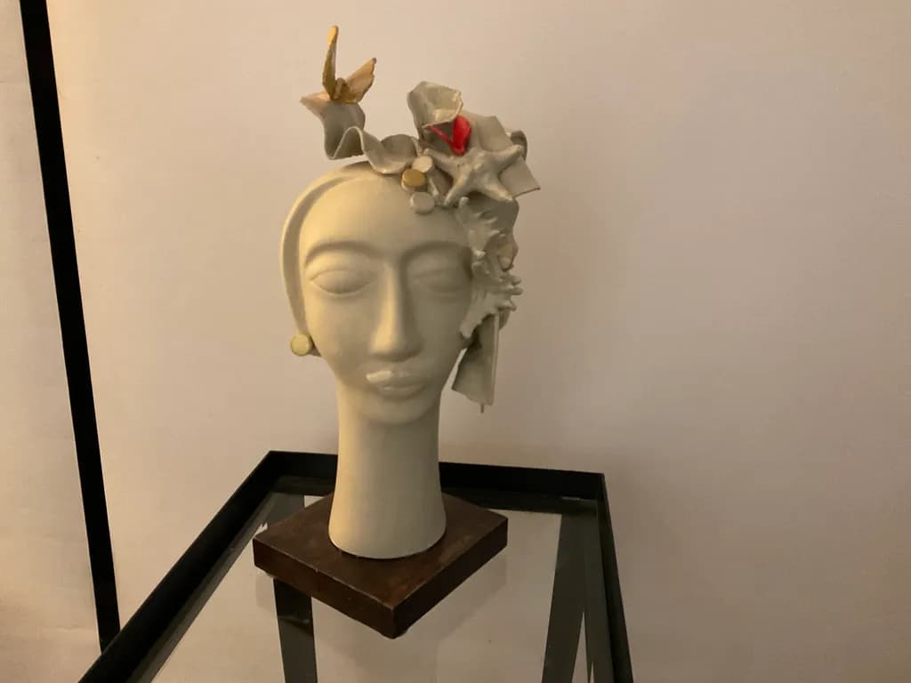 Whimsical Elegance: A Sculptural Portrait Adorned with Nature's Touch