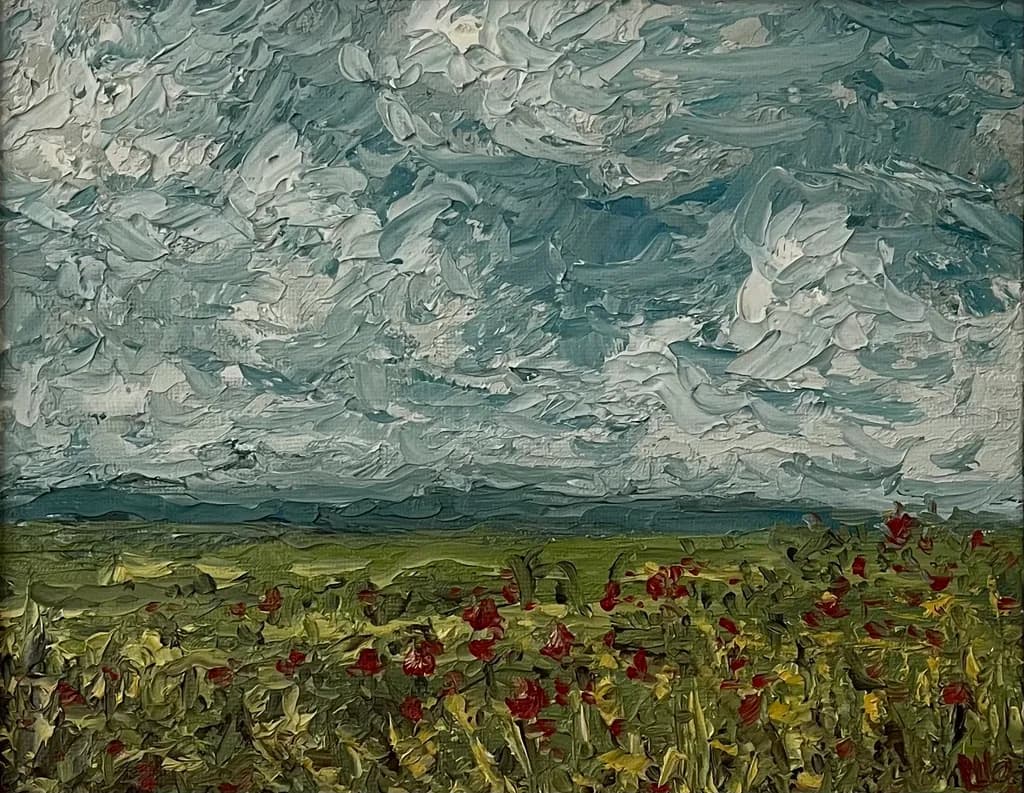 Whispers of Nature: A Vibrant Field Under a Dramatic Sky