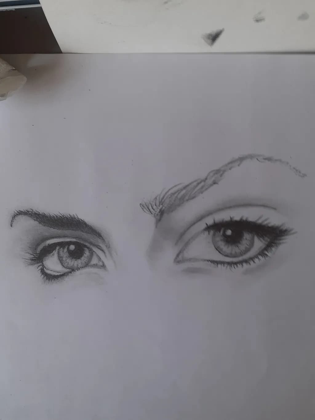 Whispers of the Soul: A Dual Gaze in Graphite