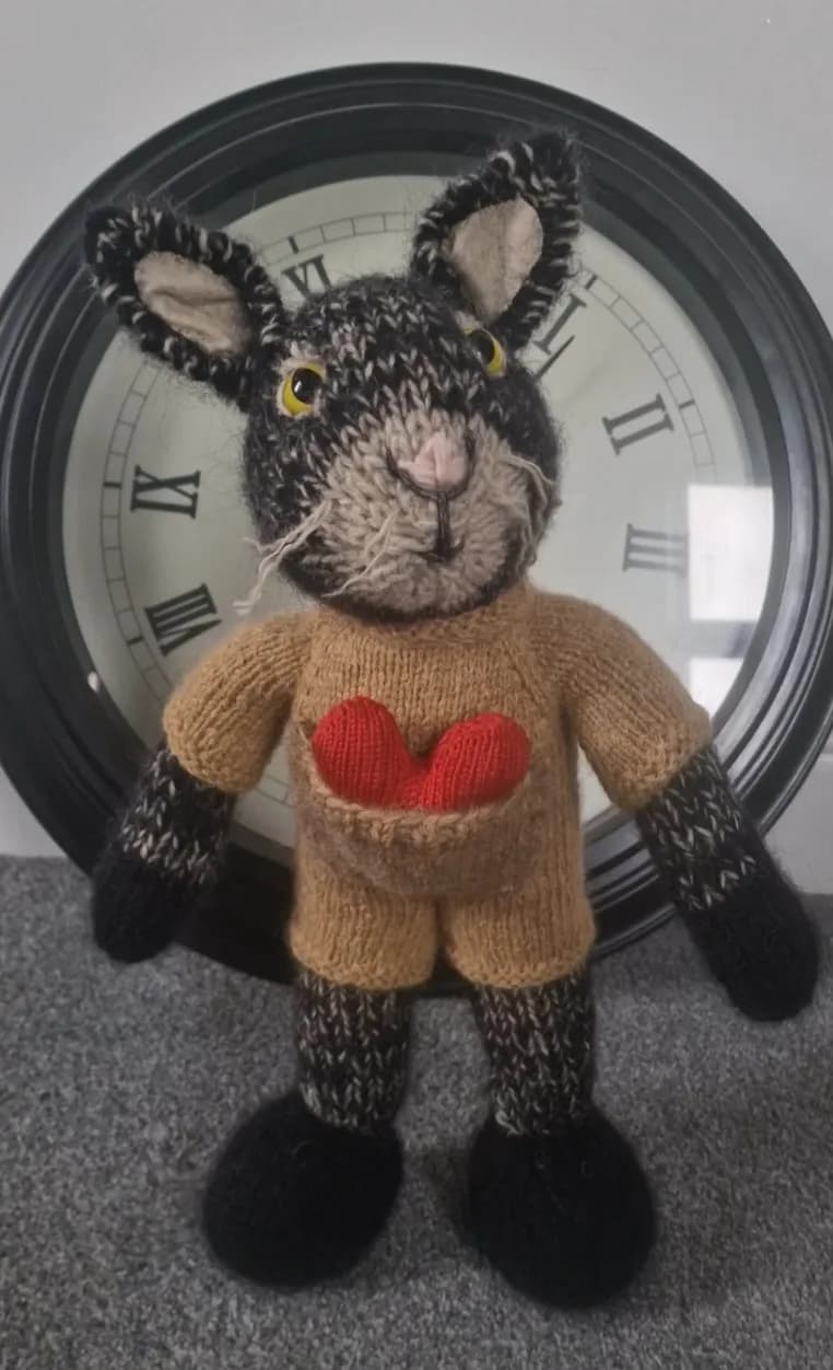 Whimsical Knitted Bunny with Heart Pocket: A Charming Handmade Plush Toy
