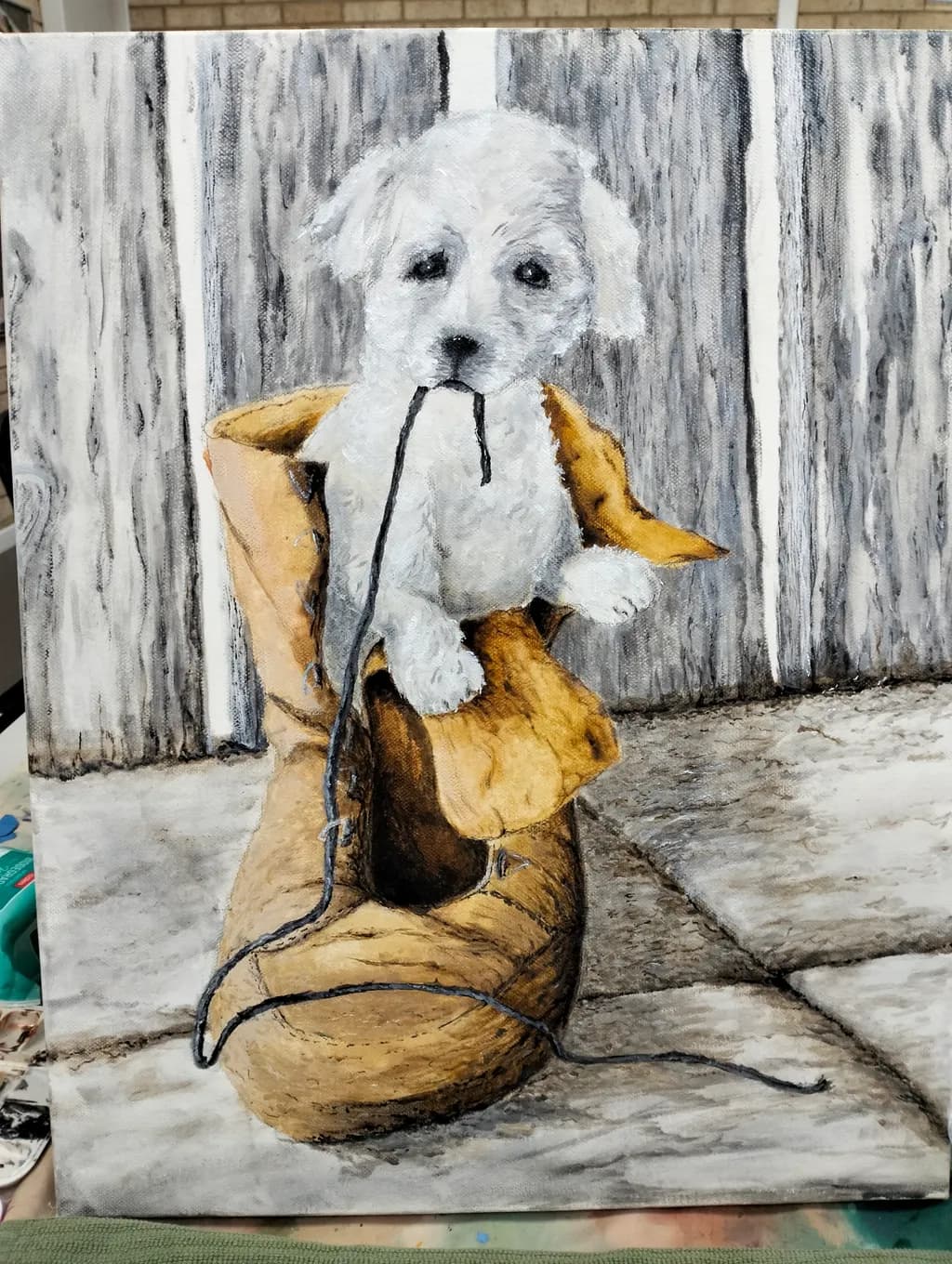 Whimsical Puppy in a Boot: A Playful Portrait of Innocence and Joy