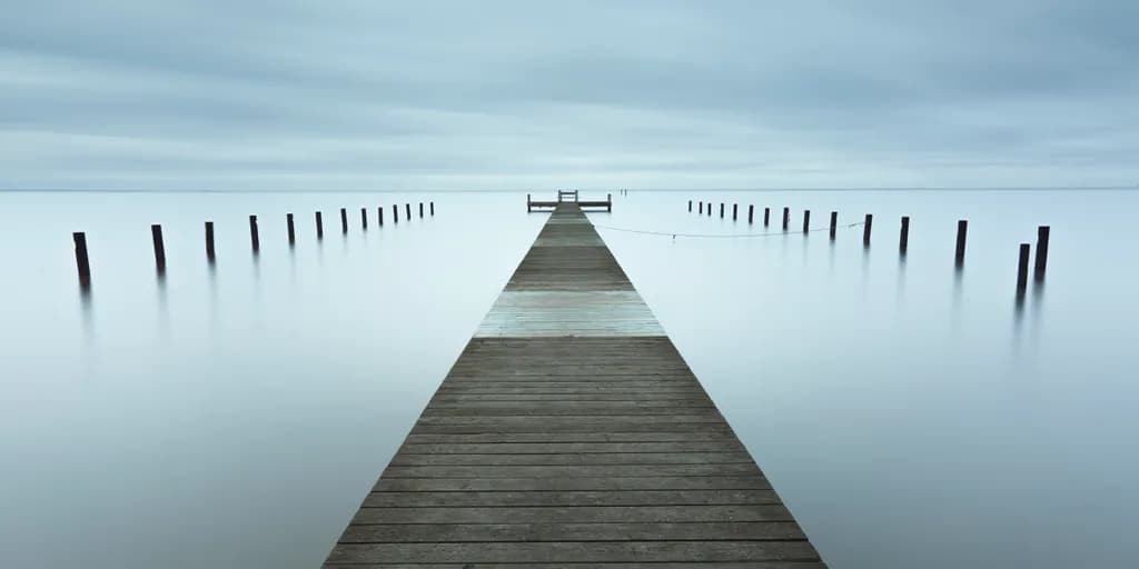 Serenity's Embrace: A Tranquil Journey Across the Still Waters of Dawn