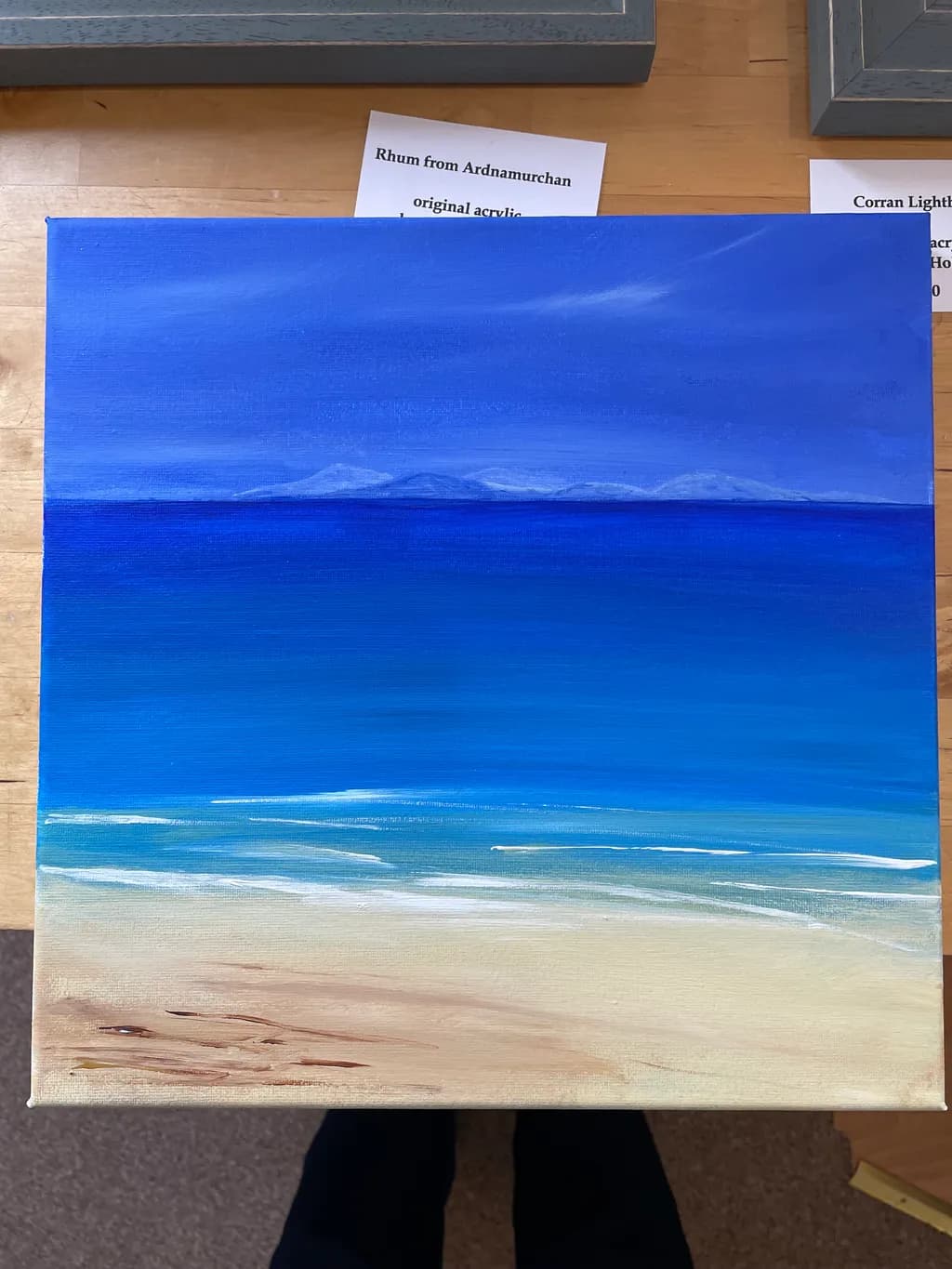 Serenity by the Shore: A Tranquil Blue Landscape of Ocean and Sky