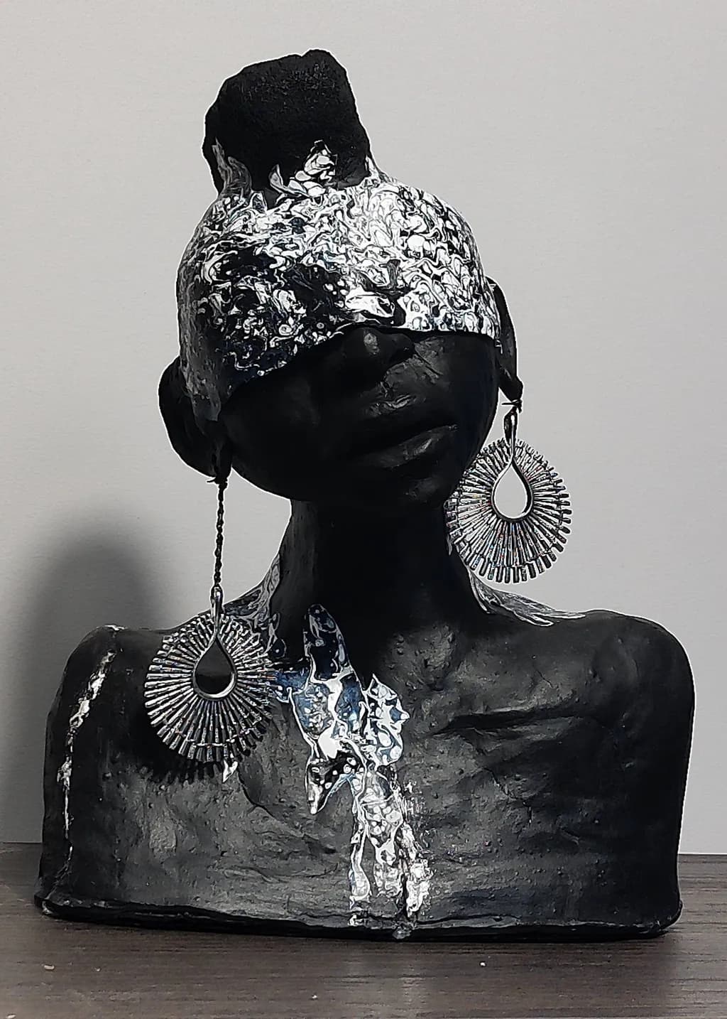 Whispers of Identity: A Modern Abstract Sculpture in Metallic Elegance