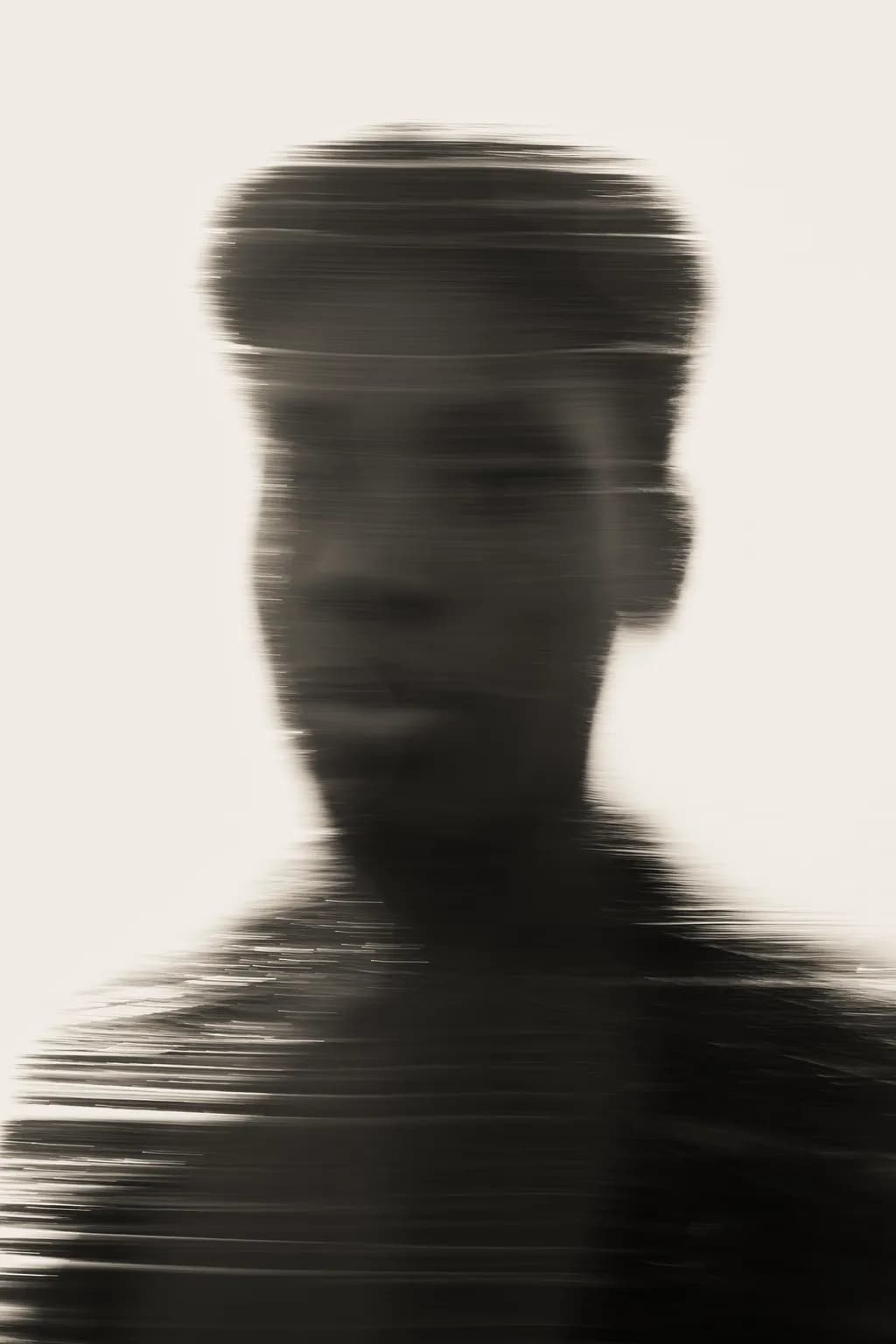 Whispers of Emotion: An Abstract Portrait in Monochrome Blurs