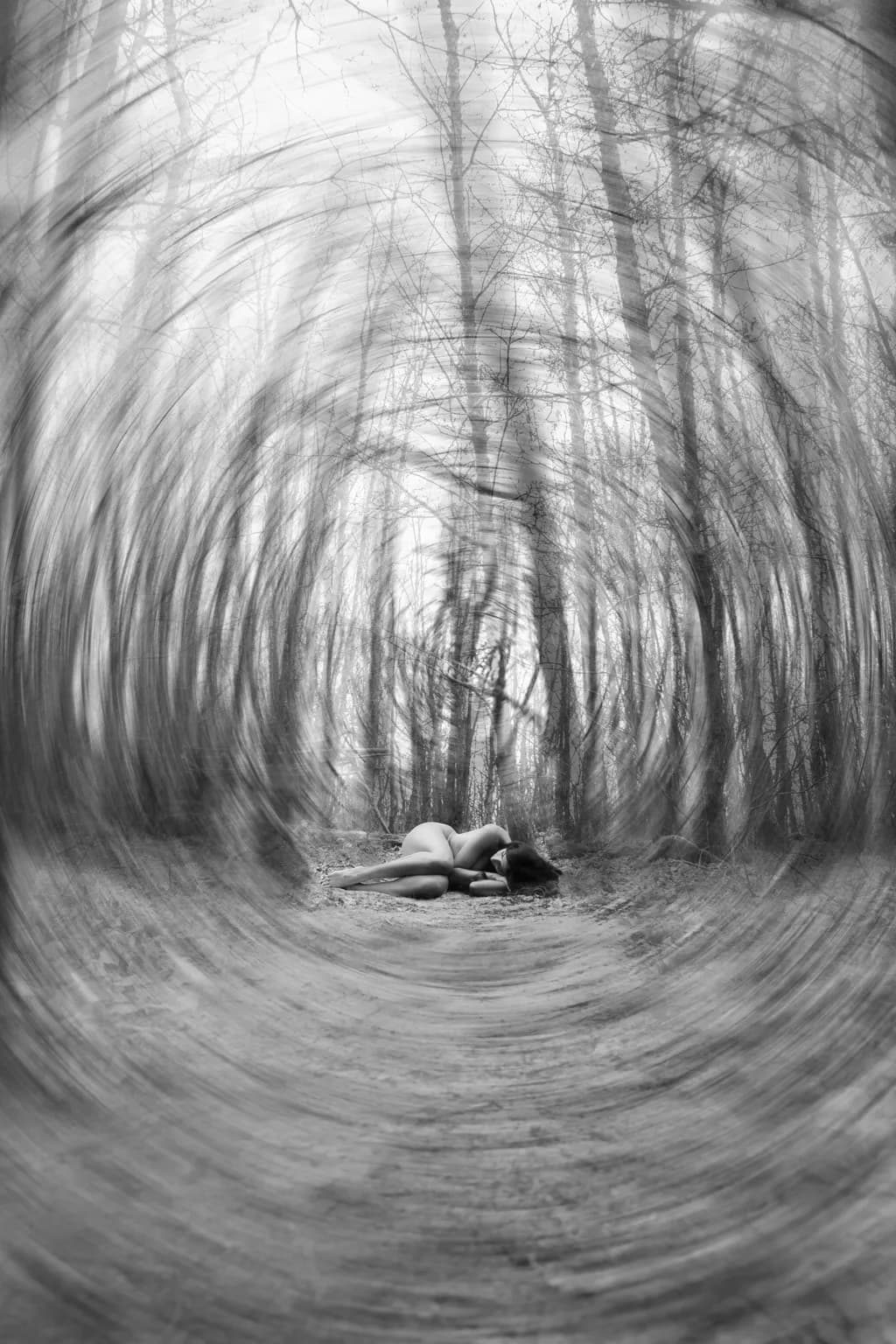 Whispers of Solitude: A Dance with Nature's Embrace in Monochrome