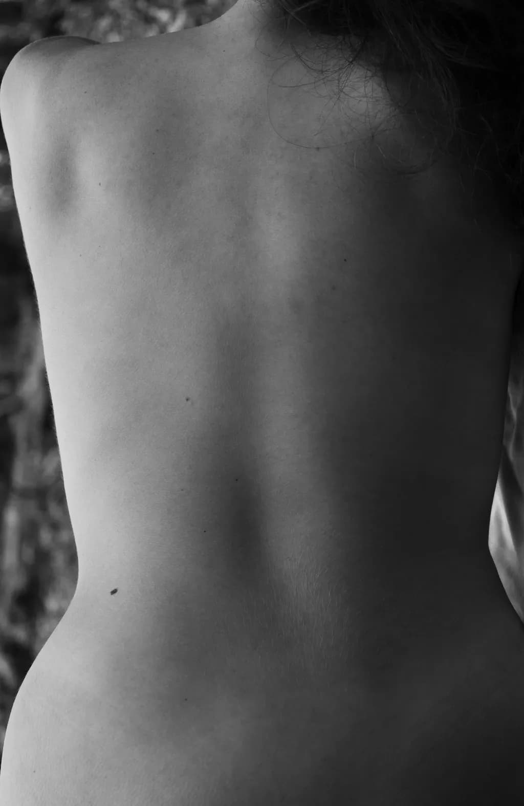 Whispers of the Unseen: A Monochrome Exploration of the Human Form