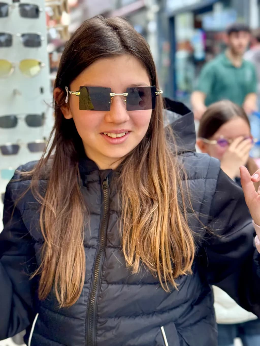 Urban Chic: A Playful Moment in Trendy Sunglasses