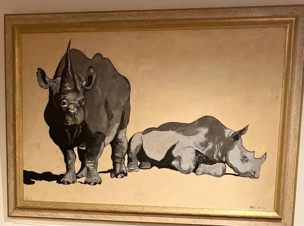 Rhino Reverie: A Dual Portrait of Strength and Serenity