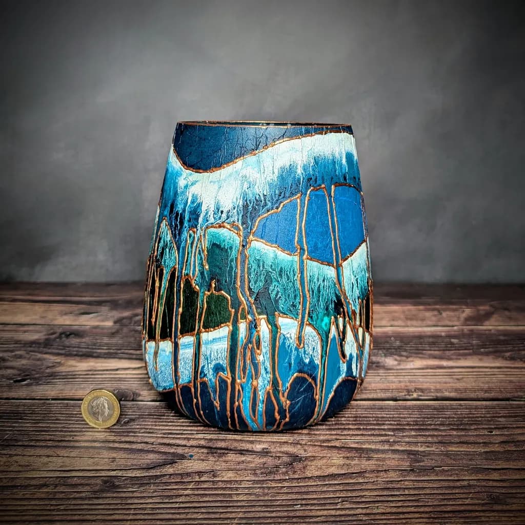 Oceanic Harmony: A Handcrafted Vessel of Blue and Gold Elegance