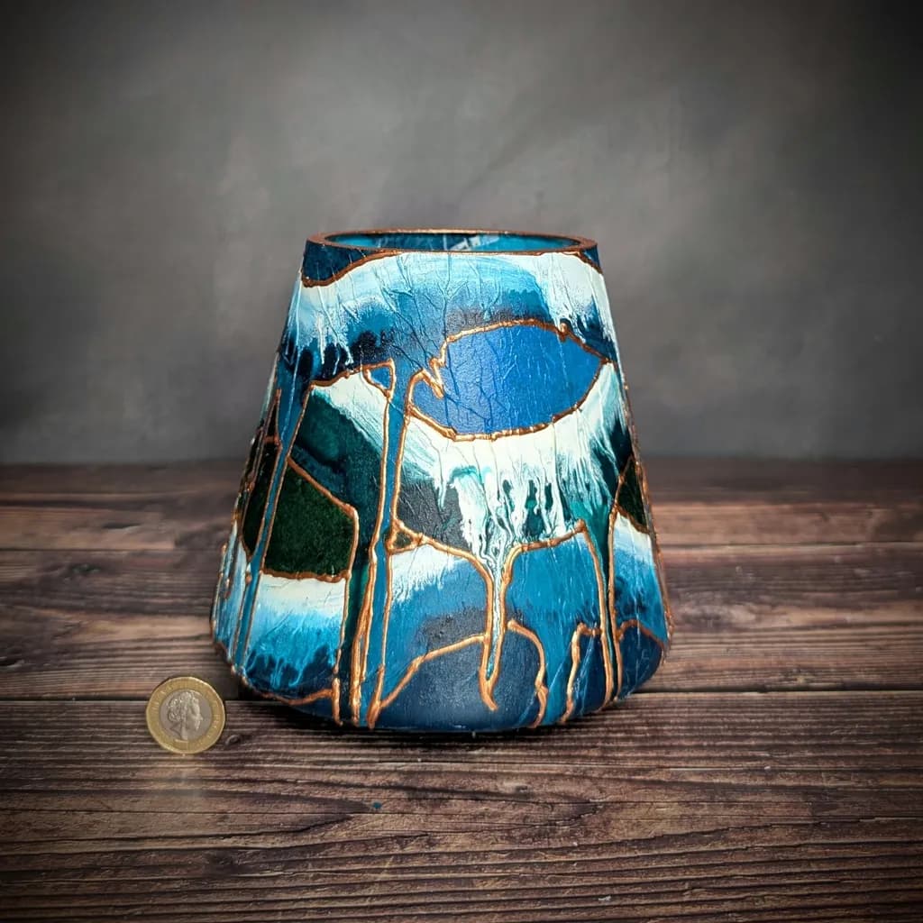 Ceramic Elegance: A Unique Blue Vase with Artistic Drip Design
