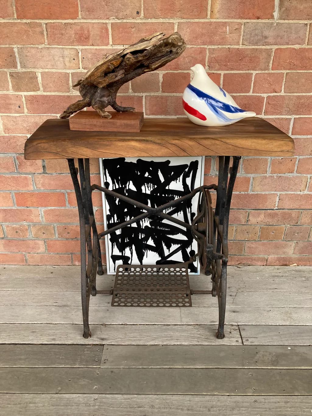 Rustic Elegance: A Unique Blend of Nature and Artistry in a Vintage Console Table Display