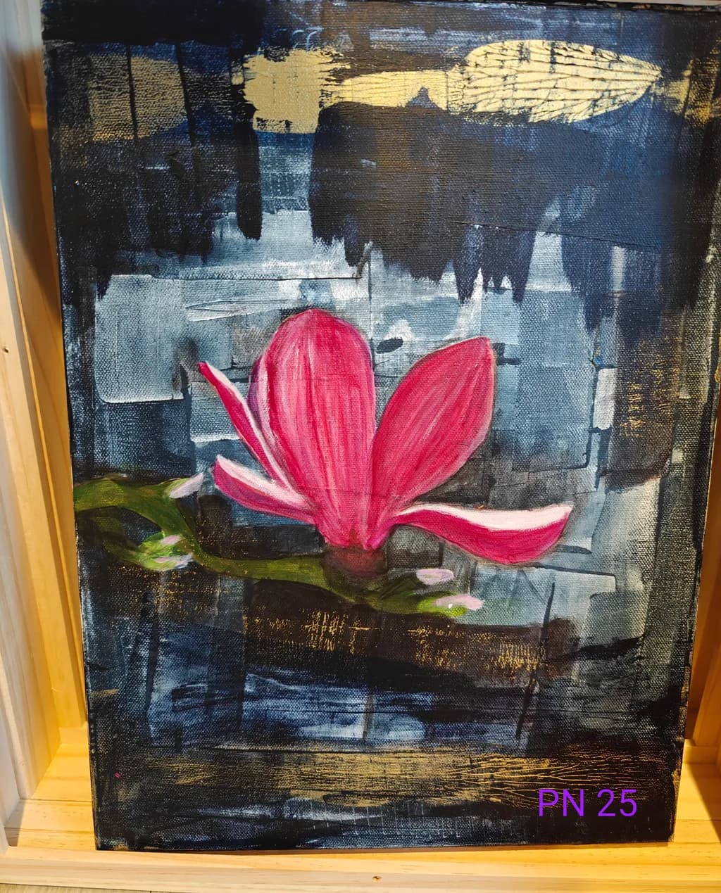 Whispers of Spring: A Vibrant Magnolia Bloom Amidst Dark Hues and Golden Accents