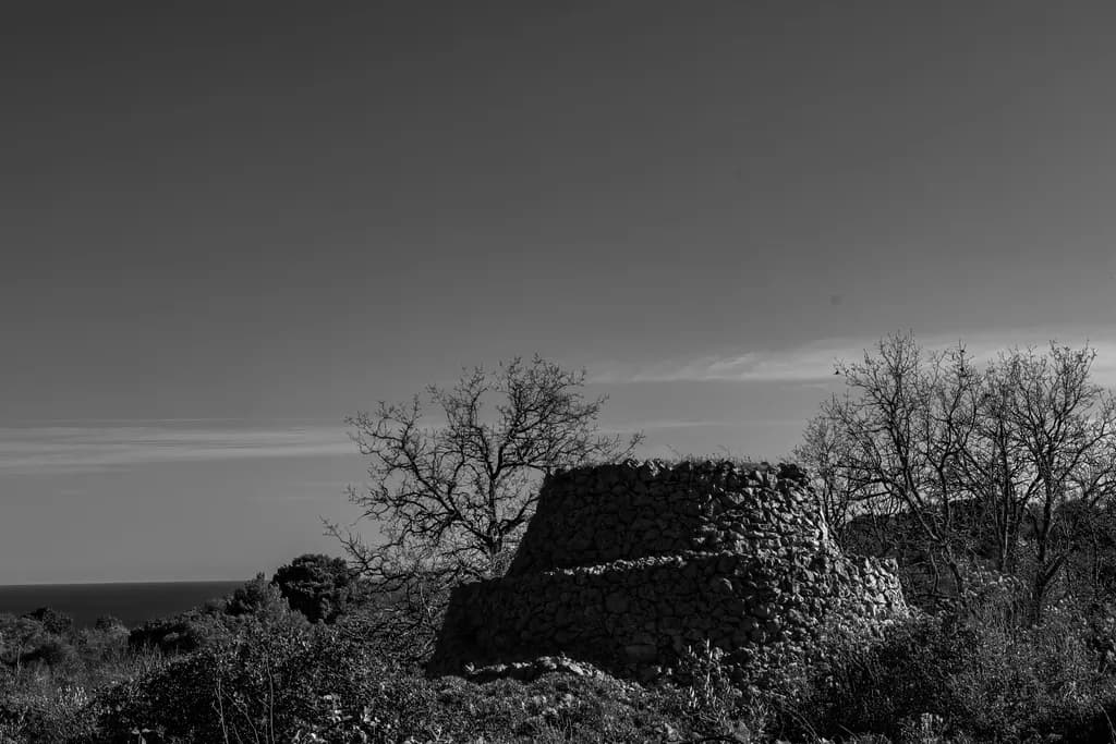 Whispers of Time: The Silent Stone Structure Against a Serene Sky