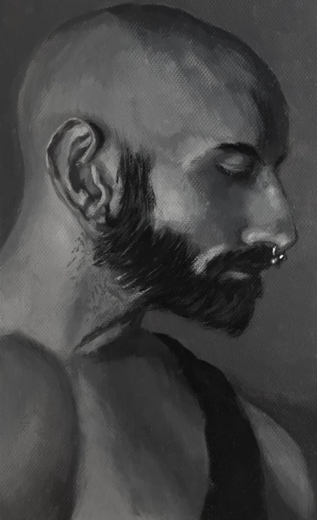 Monochrome Masculinity: A Detailed Profile Portrait of Strength and Character