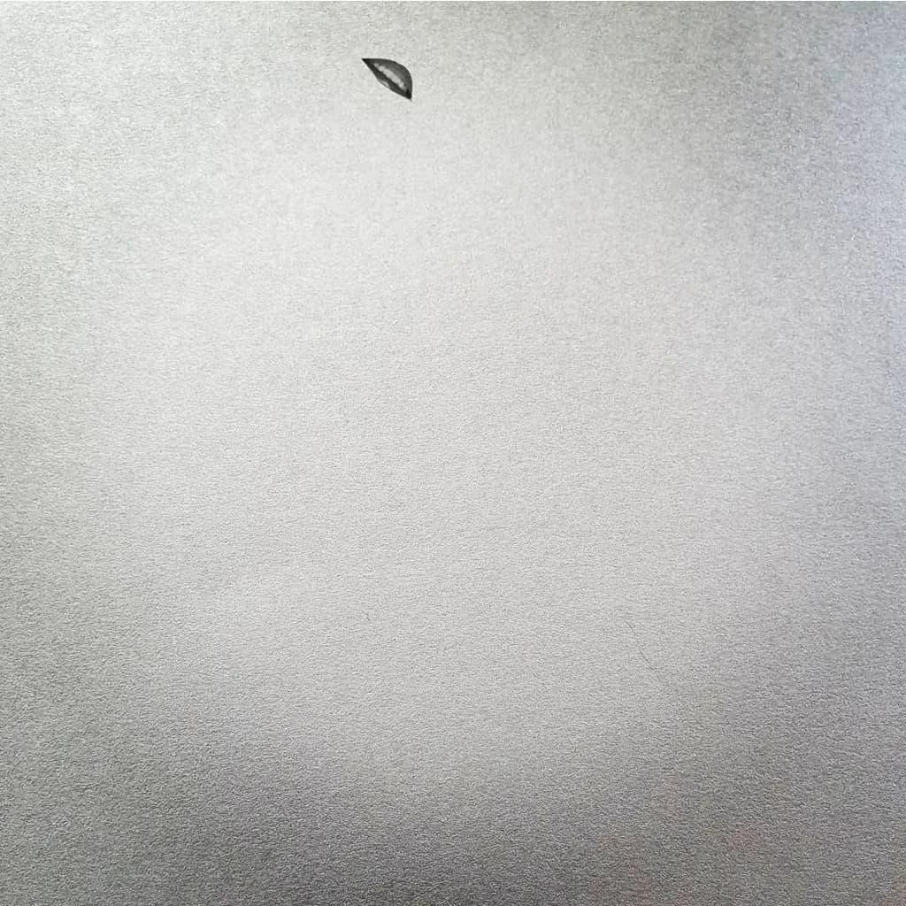 Whispers of Gray: An Abstract Exploration of Minimalist Texture and Shape