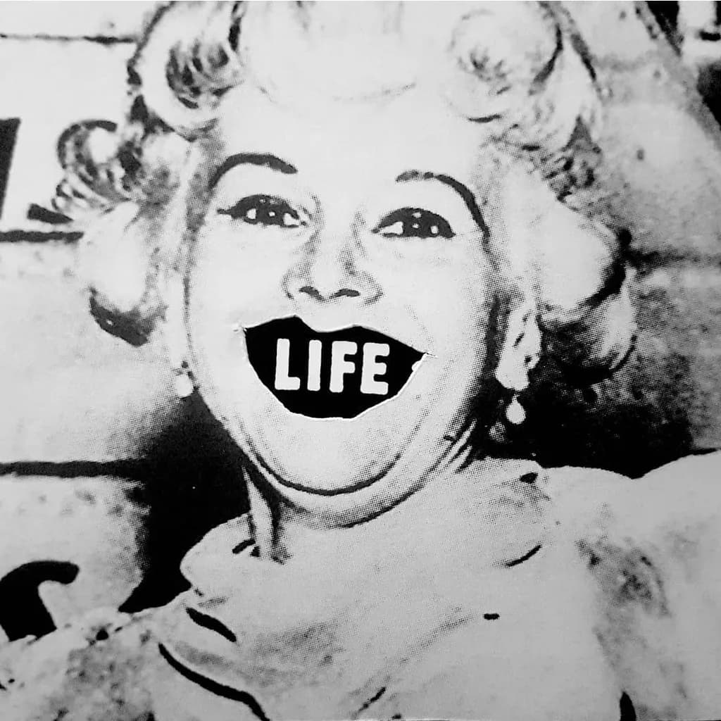 Joyful Expression: Embracing Life Through Playful Smiles in Black and White Artistry