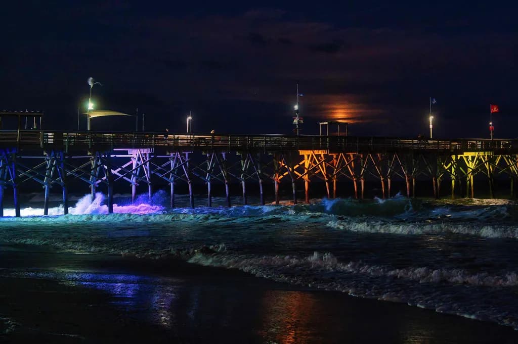 Illuminated Pier at Night