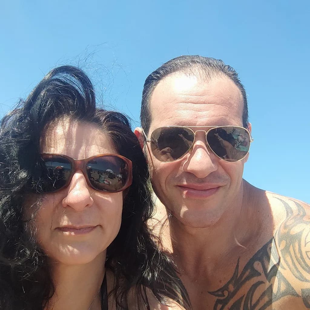 Sunny Smiles: A Beachside Portrait of Joy and Connection