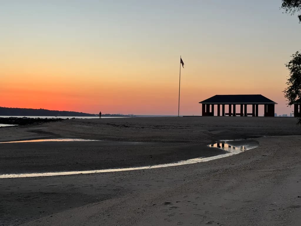 Whispers of Dusk: A Serene Beach Sunset Reflection