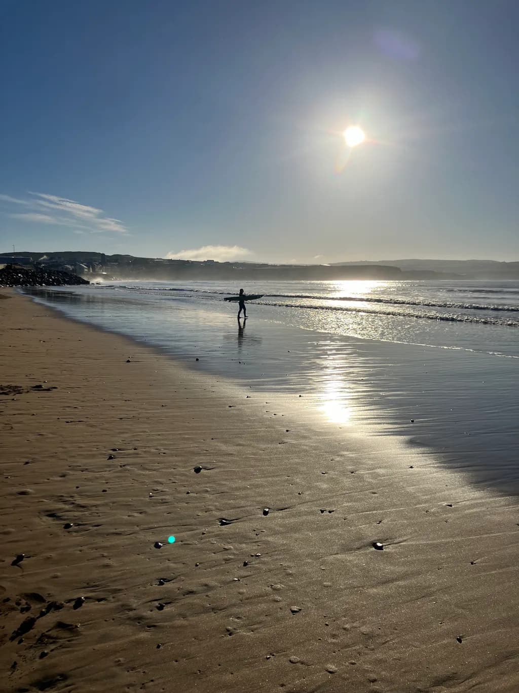Waves of Serenity: A Surfer's Journey at Dawn