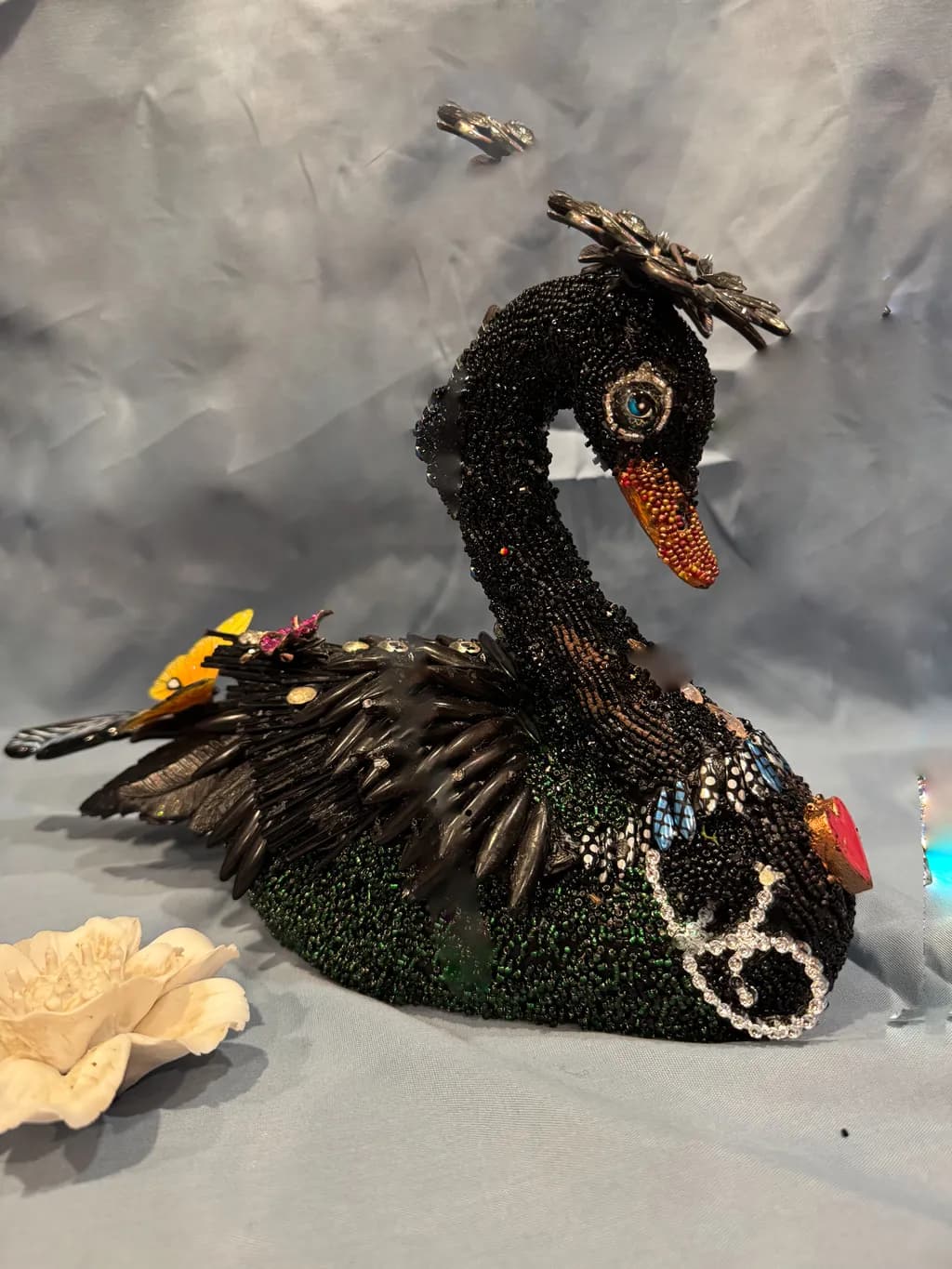 Elegant Black Swan: Intricate Beaded Sculpture with Nature-Inspired Details