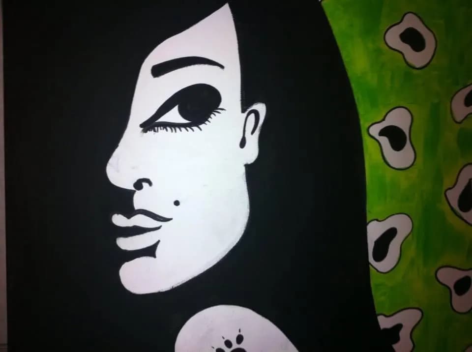 Whispers of Green: An Abstract Portrait in Black and White