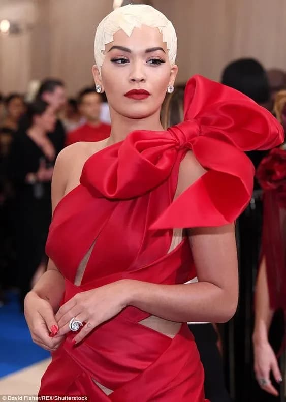 Radiant Elegance: A Bold Statement in Red Fashion at the Met Gala