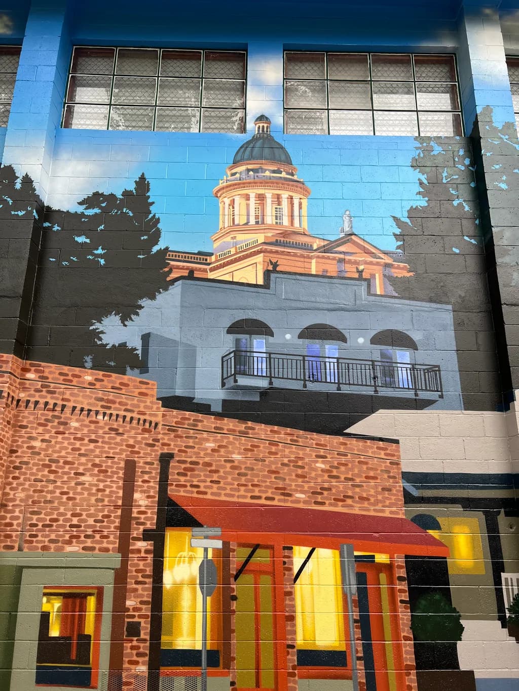 Urban Harmony: A Vibrant Mural Celebrating Architectural Beauty and Community Life