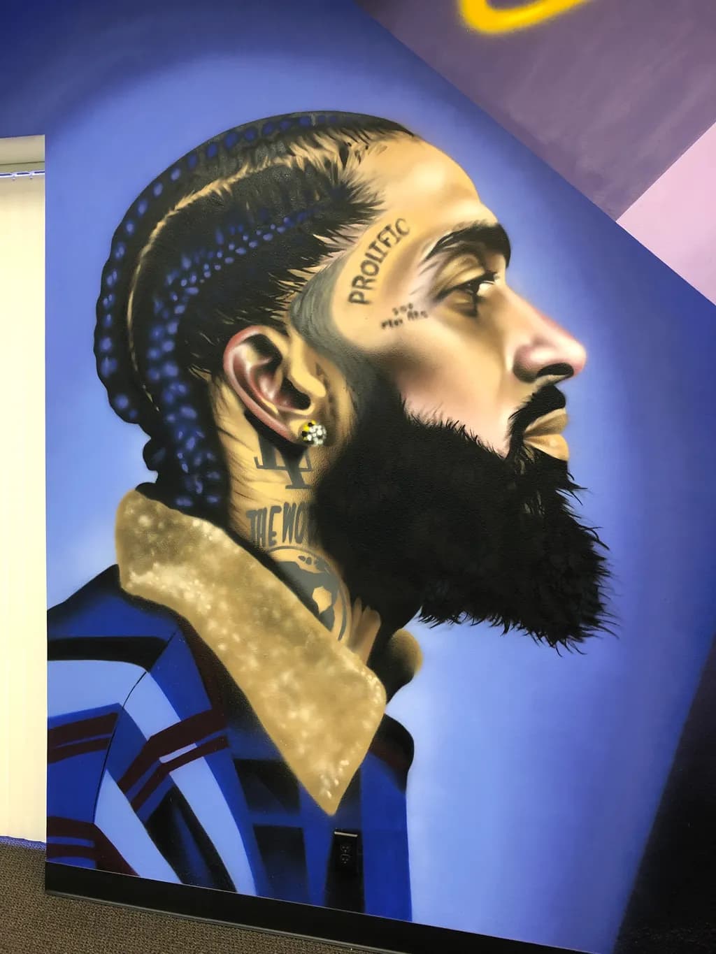 Urban Expression: A Graffiti Portrait of Resilience and Style