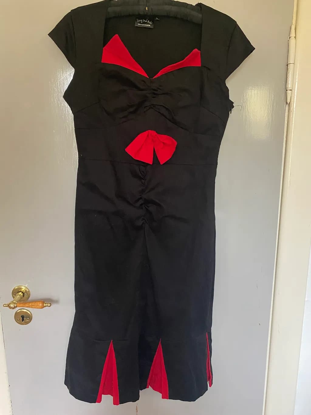 Elegant Black and Red Vintage-Inspired Dress with Bow Detail