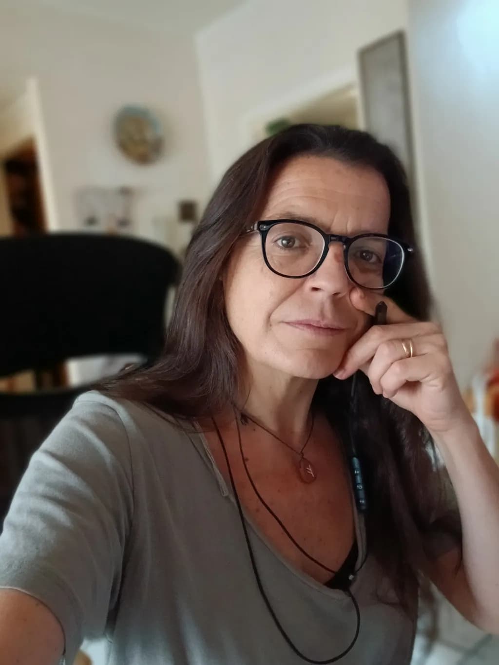 Contemplative Moments: A Portrait of Thoughtfulness in Casual Surroundings
