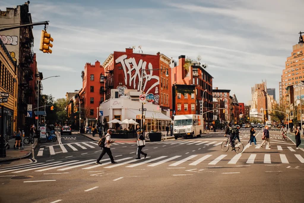 Urban Symphony: A Vibrant Dance of People and Graffiti in the Cityscape