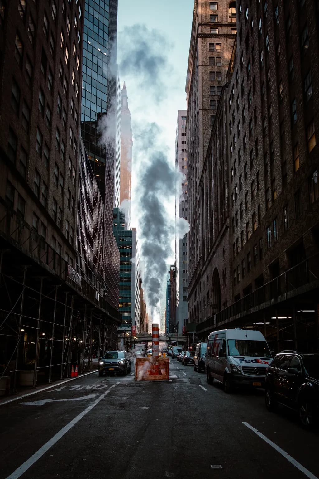 Urban Symphony: Steam and Shadows in the Cityscape