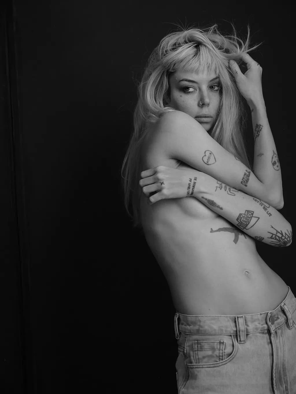 Whispers of Vulnerability: A Black and White Portrait of Self-Expression
