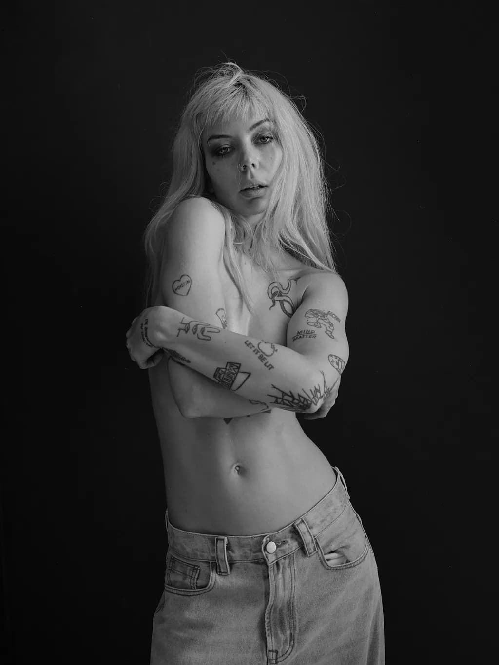 Ethereal Embrace: A Black and White Exploration of Body Art and Identity