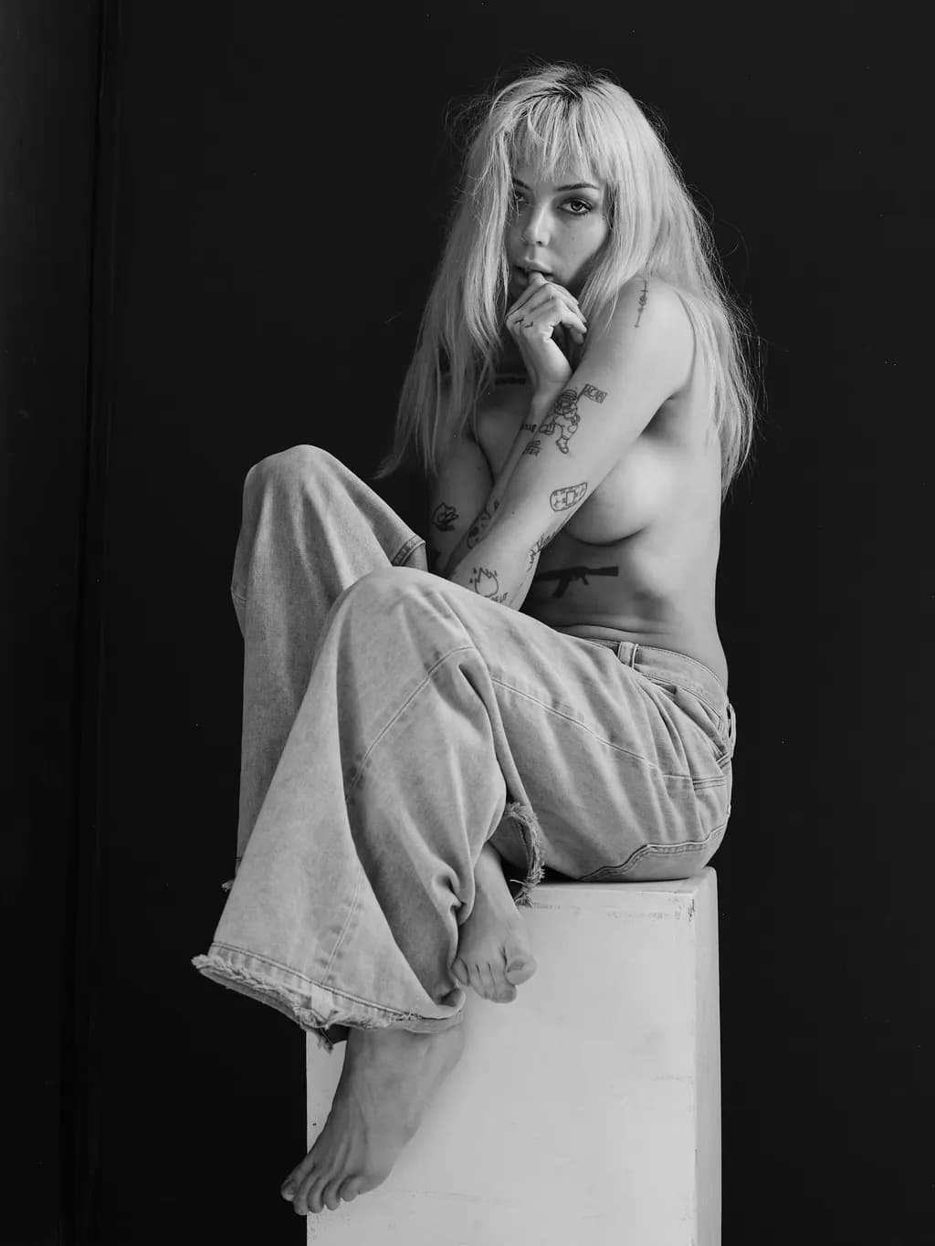 Whispers of Monochrome: A Contemplative Portrait of Edgy Elegance