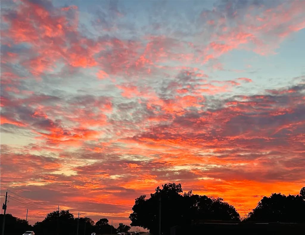Ethereal Sunset Symphony: A Vibrant Dance of Colors in the Sky