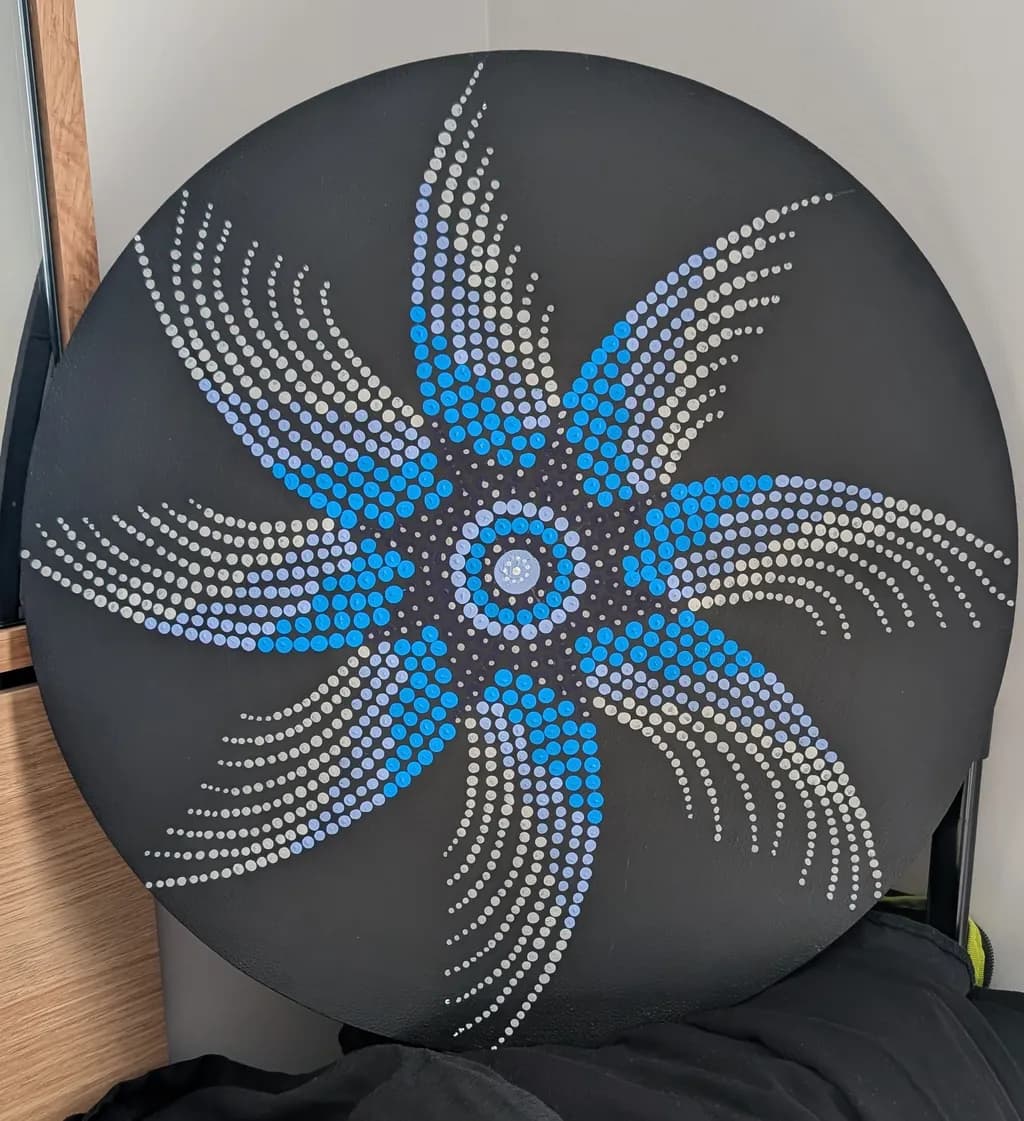 Whispers of the Ocean: A Mesmerizing Blue and White Dot Mandala on Black Canvas