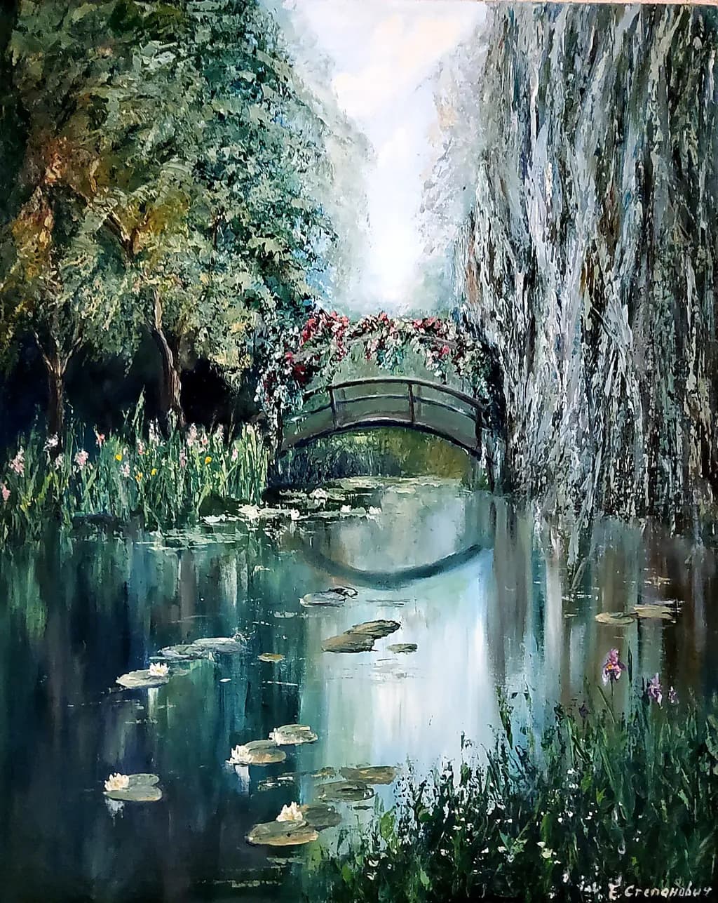 Serene Reflections: A Tranquil Landscape of Water Lilies and a Charming Bridge