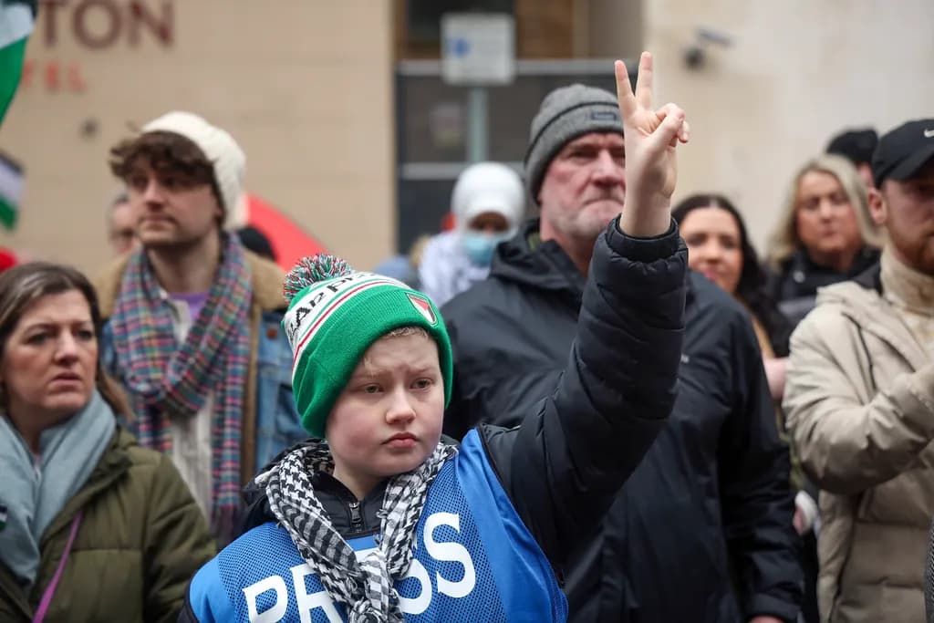 Voices of Tomorrow: A Young Advocate's Silent Protest in a Sea of Determination