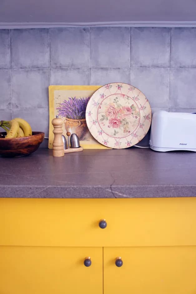 Charming Kitchen Still Life: Vintage Plate, Fresh Bananas, and Sunny Yellow Accents