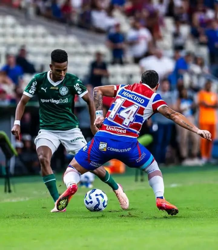 Dynamic Duel on the Field: A Captivating Moment in Soccer Action