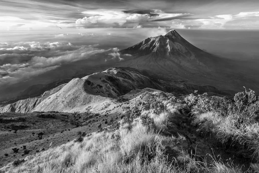 Majestic Monochrome Mountains: A Scenic Journey Through Cloud-Covered Terrain