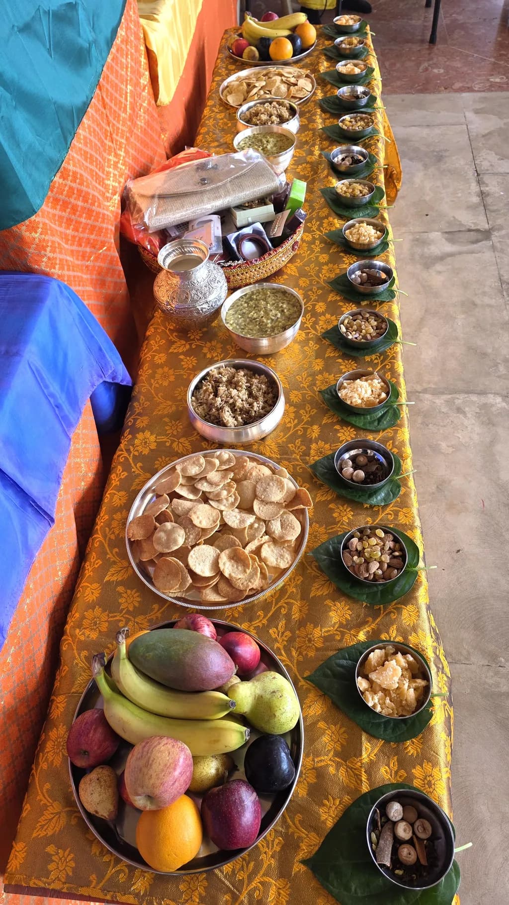 Vibrant Feast: A Colorful Array of Traditional Delicacies and Fresh Fruits on a Festive Table