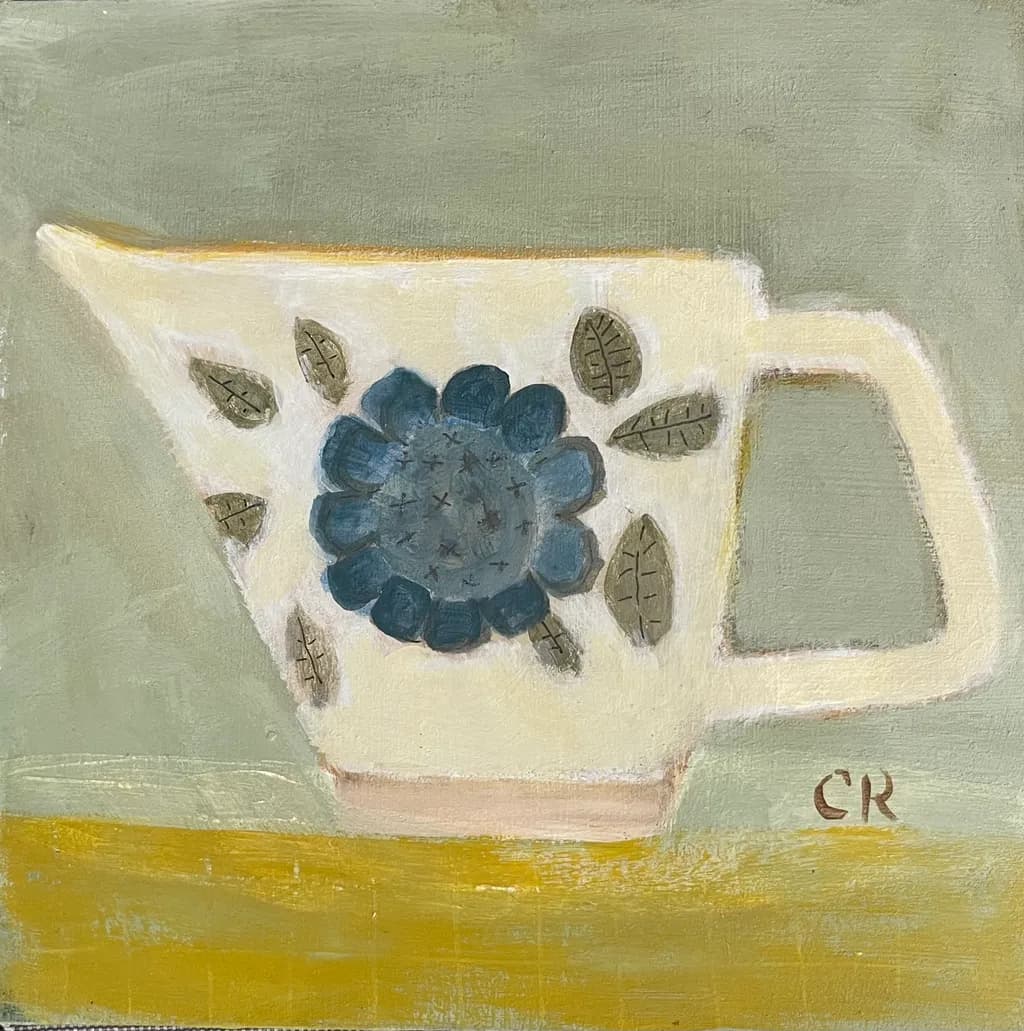 Whimsical Harmony: A Vintage-Inspired Floral Jug Embracing Coastal Nostalgia