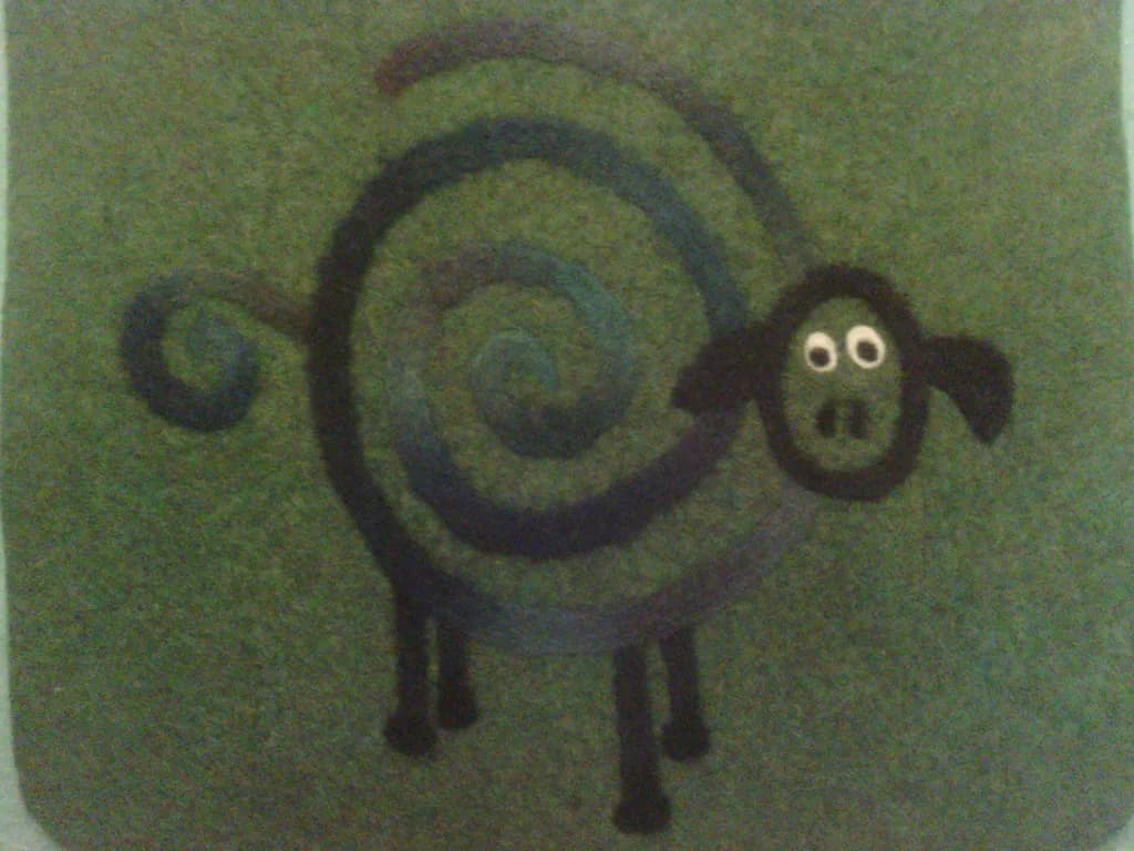 Whimsical Spiral Sheep: A Playful Green Delight in Artistry